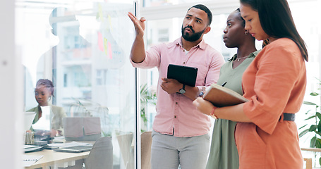 Image showing Business people, planning and teamwork in meeting for schedule, tasks or strategy on glass board at office. Group of employees in team brainstorming, idea or reminder for agenda together at workplace