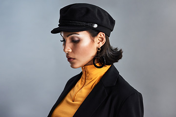 Image showing Quiet beauty can speak the loudest. Studio shot of a beautiful young woman posing against a grey background.