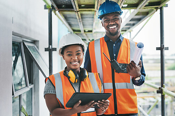 Image showing Technology touches almost every aspect of our operations. Portrait of a young man and woman working at a construction site.