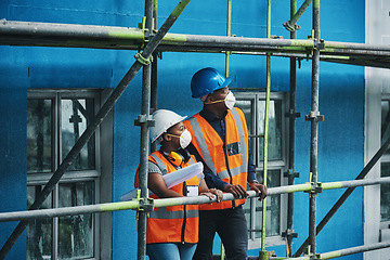 Image showing Ensuring the site satisfies the project standards and specifications. a young man and woman working at a construction site.