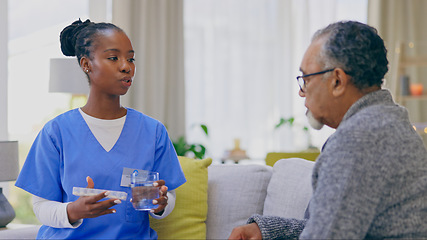 Image showing Assisted living, healthcare of medicine with an old man and nurse in a home for medical care or treatment. Help, pills or chronic medication with a black woman volunteer talking to a senior patient
