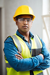 Image showing Hell get your project going. a engineer wearing protective gear on a construction site.