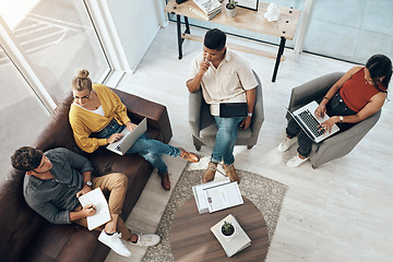 Image showing Getting together to come up with some innovative ideas. High angle of a group of businesspeople having a discussion in an office.