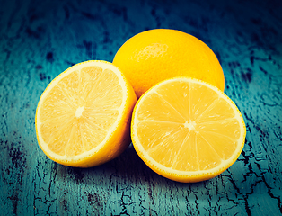 Image showing Lemon and cut half slices