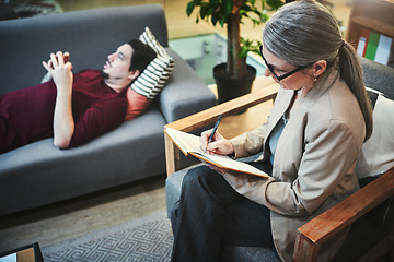 Image showing If it gives you grief, get it off your chest. a young man having a therapeutic session with a psychologist.