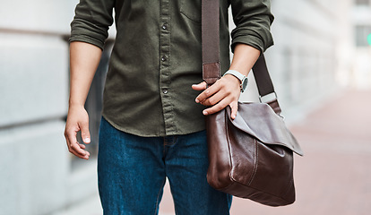 Image showing Do something daily that gets you closer to your goal. an unrecognisable businessman walking through the city.