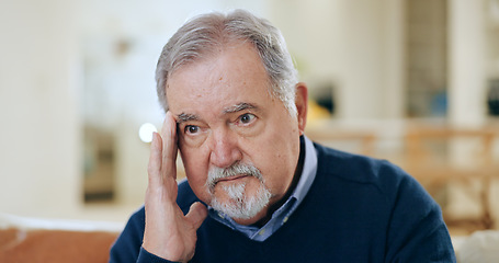 Image showing Stress, headache or old man in house thinking of burnout or worry in retirement frustrated by debt. Sad, anxiety or tired male senior person with problem, crisis or exhausted on couch with migraine