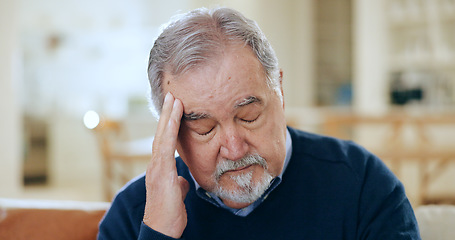 Image showing Senior man, headache and stress in mistake, financial crisis or retirement debt on living room sofa at home. Mature male person with migraine, anxiety or depression in loss or mental health at house