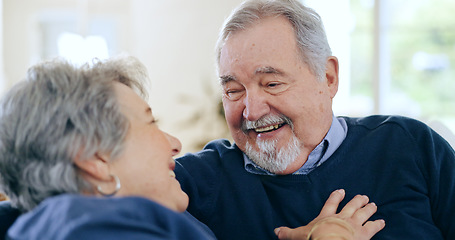 Image showing Home, conversation and senior couple on a couch, funny and happiness with retirement in a living room. Romance, old man and elderly woman with love, support and funny with discussion and laughing