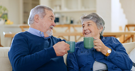 Image showing Tea, love and a senior couple in their home to relax together in retirement for happy bonding. Smile, romance or conversation with an elderly man and woman drinking coffee and toast in living room