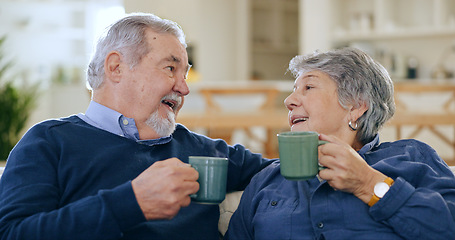 Image showing Coffee, love and a senior couple in their home to relax together during retirement for happy bonding. Smile, romance or conversation with an elderly man and woman drinking tea in their living room