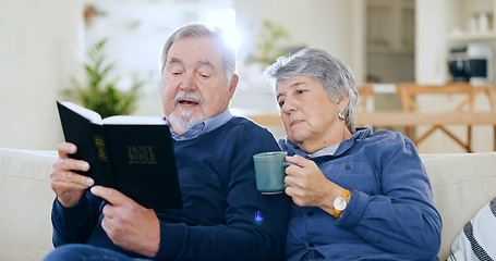 Image showing Coffee, bible and a senior couple in their home to read a book together during retirement for religion. Faith, belief or spiritual with an elderly man and woman learning about god in the living room