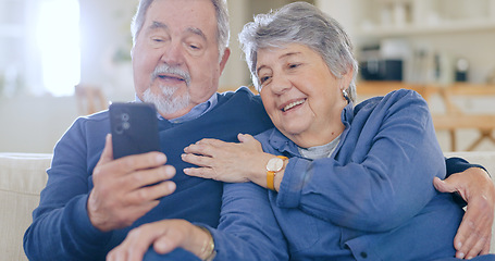 Image showing Home, typing and senior couple with smartphone, love and connection with social media, speaking and post. People, mature man and old woman with cellphone, online reading and website information