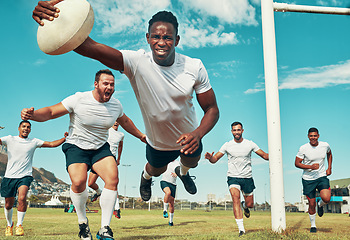 Image showing Not all heroes wear capes. a rugby player scoring a try while playing on a field.