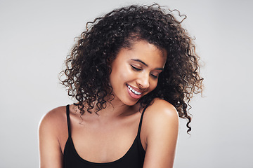 Image showing Be good to your skin. Studio shot of a beautiful young woman posing against a grey background.