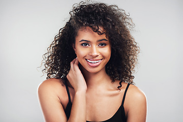 Image showing I take good care of my skin. Studio shot of a beautiful young woman posing against a grey background.