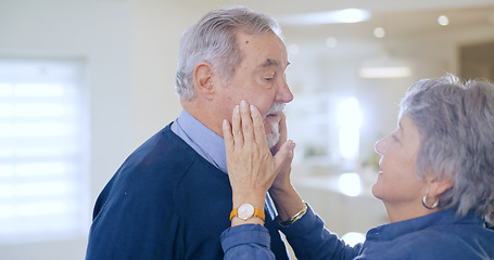 Image showing Old couple, love or touch on face in home to relax for romance, support, bond with trust, care or comfort. Elderly people together in marriage, house or retirement with commitment, affection or peace