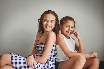 Image showing We have each others backs. two young girls spending time together at home.