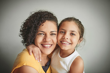 Image showing Shes my daughter and my best friend. a woman and her young daughter smiling at the camera.