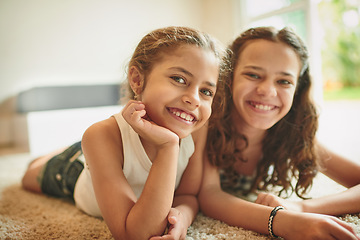 Image showing They have the cutest smiles. two young girls spending time together at home.