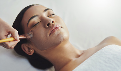 Image showing Your complexion will be flawless after this. a young woman getting a facial treatment at a spa.