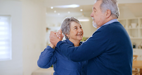 Image showing Home, dancing and senior couple with love, celebration and retirement with romance in a living room. Romantic, elderly woman and old man with happiness, move and anniversary with a smile and cheerful