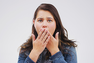 Image showing I cant believe what Im seeing. Studio shot of a young woman looking shocked against a grey background.