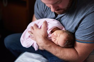 Image showing Ill always be there to protect you sweet angel. an adorable infant girl sleeping in her fathers arms in hospital.