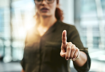 Image showing Change is at the tip of your fingers. an unrecognizable businesswoman connecting to a user interface with her finger.