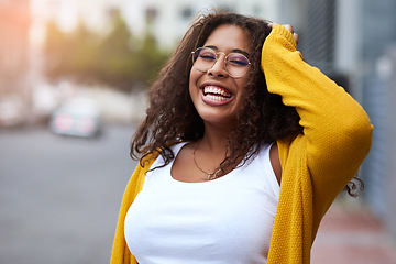 Image showing Being me makes me so happy. Cropped portrait of a happy young woman standing outdoors in an urban setting.