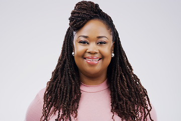 Image showing Share your smile with the world. Studio portrait of an attractive young woman smiling against a grey background.