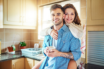 Image showing Mornings are for coffee and my favorite person. an affectionate couple spending time together at home.