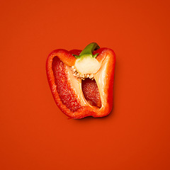 Image showing The more colourful the better. a red pepper against a studio background.