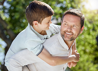 Image showing How fast should we go. a man spending time outdoors with his young son.