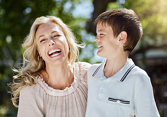 Image showing My son is quite a jokester. a woman spending time outdoors with her young son.