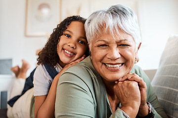 Image showing Dont lose your smile. a grandmother spending time with her grandchild at home.