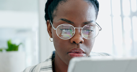 Image showing Serious black woman, business and research on tablet, reading email on app and planning in creative startup office. Digital technology, professional and African designer working on internet project