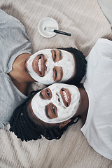 Image showing Romance isnt based on gender roles. a young couple getting homemade facials together at home.