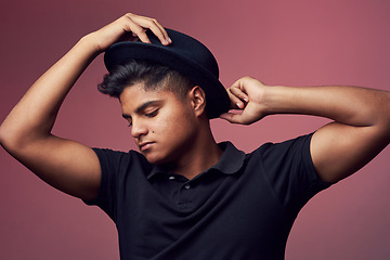 Image showing What a good-looking young man he is. Studio shot of a handsome young man wearing a hat.