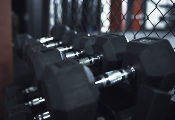 Image showing Its not going to lift itself. Still life shot of dumbbells in a gym.