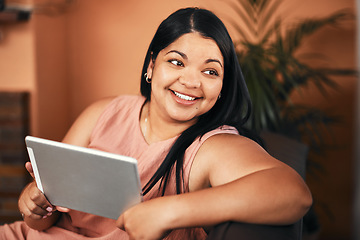 Image showing Im sorted with my weekend entertainment. a young woman using a digital tablet at home.