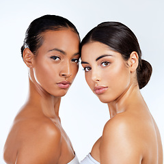 Image showing Let your difference bring you together. Studio shot of beautiful young women posing against a grey background.