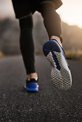 Image showing Youll succeed as long as you keep going. Closeup shot of an unrecognizable man exercising outdoors.