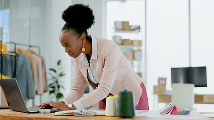 Image showing Black woman, laptop and fashion designer in small business, office or ideas at boutique store. African female person working on computer in logistics for clothing, planning or schedule delivery