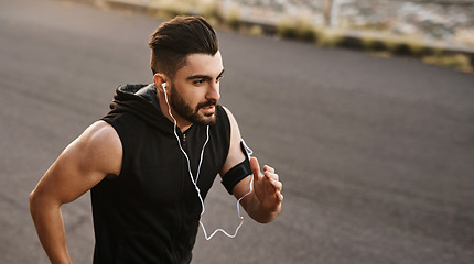 Image showing Start the race towards your goals. a sporty young man exercising outdoors.