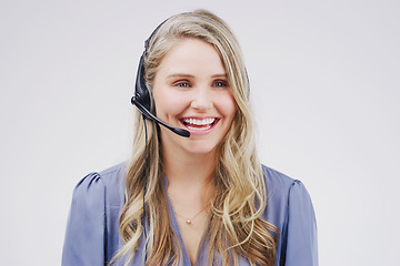 Image showing I take the positive approach in my career. Studio shot of an attractive young female customer service representative wearing a headset against a grey background.