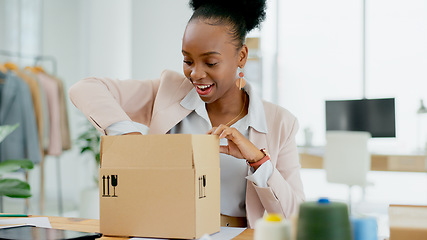 Image showing Happy black woman, box and fashion designer in supply chain, small business or inventory for boutique store. African female person smile with parcel, package or cargo for delivery or courier service