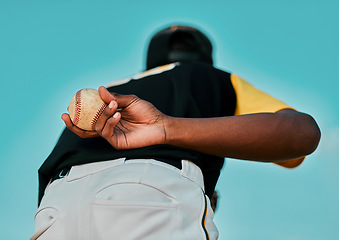 Image showing I hope you have what it takes. Rearview shot of a baseball player holding the ball behind his back.