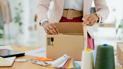 Image showing Woman, hands and box of fashion designer in small business, supply chain or logistics at boutique store. Closeup of female person packing boxes for clothing, delivery or courier service at shop