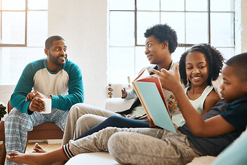 Image showing We do both bedtime stories and morning time stories. a little brother and sister reading a book while their parents watch at home.